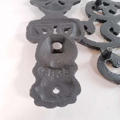 LOT 185: Cast Iron Trivets, Pewter Bean Pots, Pressed Glass Cakestand & More