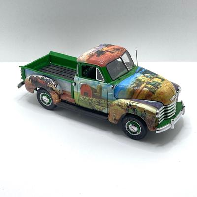 LOT 191: The Danbury Mint Mort Kuntsler 1953 Chevrolet Farmer's Pickup, 1971 Jaguar E-Type Diecast Toy Car and The Danbury Mint...