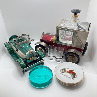 LOT 192: Vintage Automobile Decanter with Shot Glasses, Hallmark Kiddie Car Classics Toy Car, 1987 Glasstown Auto Show Paper Weight and...
