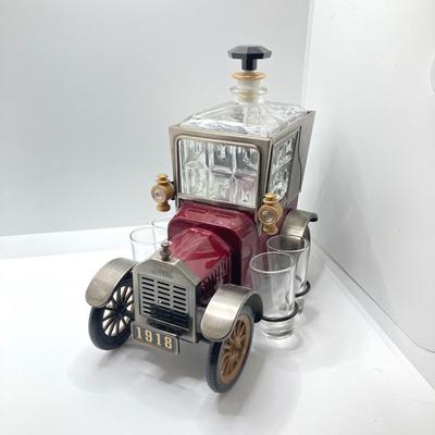 LOT 192: Vintage Automobile Decanter with Shot Glasses, Hallmark Kiddie Car Classics Toy Car, 1987 Glasstown Auto Show Paper Weight and...