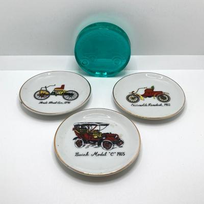 LOT 192: Vintage Automobile Decanter with Shot Glasses, Hallmark Kiddie Car Classics Toy Car, 1987 Glasstown Auto Show Paper Weight and...