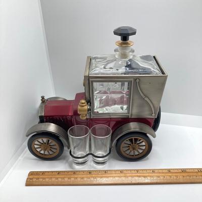 LOT 192: Vintage Automobile Decanter with Shot Glasses, Hallmark Kiddie Car Classics Toy Car, 1987 Glasstown Auto Show Paper Weight and...