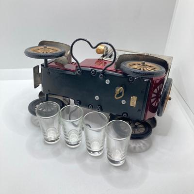 LOT 192: Vintage Automobile Decanter with Shot Glasses, Hallmark Kiddie Car Classics Toy Car, 1987 Glasstown Auto Show Paper Weight and...