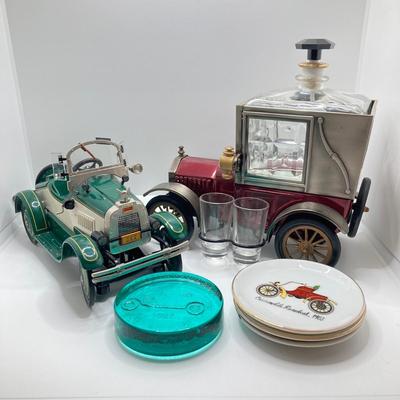 LOT 192: Vintage Automobile Decanter with Shot Glasses, Hallmark Kiddie Car Classics Toy Car, 1987 Glasstown Auto Show Paper Weight and...