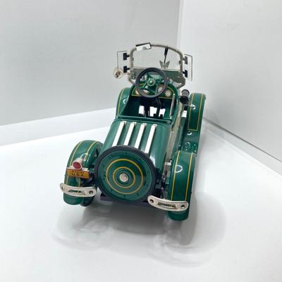 LOT 192: Vintage Automobile Decanter with Shot Glasses, Hallmark Kiddie Car Classics Toy Car, 1987 Glasstown Auto Show Paper Weight and...