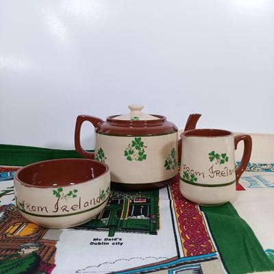 LOT 217: Irish Collection of Pottery, Linens, Celtic Cross, Books & More