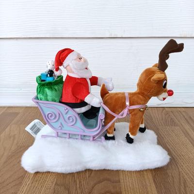 LOT 223: Vintage Christmas Train Sets with Santa in Rocking Chair & Rudolph and Santa