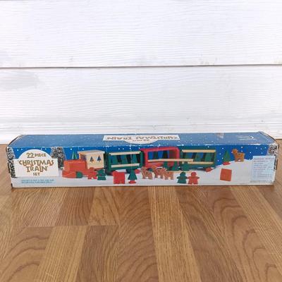 LOT 223: Vintage Christmas Train Sets with Santa in Rocking Chair & Rudolph and Santa