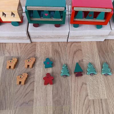 LOT 223: Vintage Christmas Train Sets with Santa in Rocking Chair & Rudolph and Santa