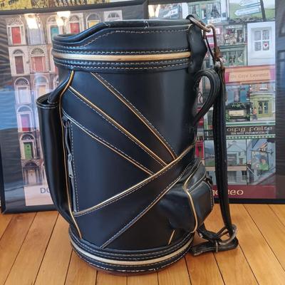 LOT 225: Golf Bag Trash Can with Golf Book and Framed Posters from Ireland