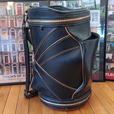 LOT 225: Golf Bag Trash Can with Golf Book and Framed Posters from Ireland