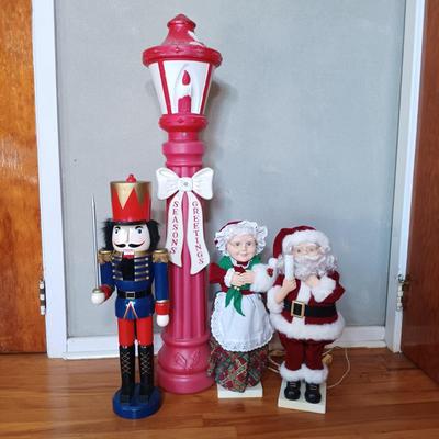 LOT 230: BECO Blow Mold Christmas Lamp Post with Nutcracker, Mrs Claus & Santa Claus