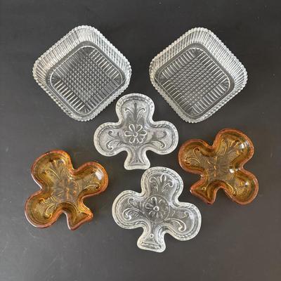 LOT 86: It's Good to Be Irish Collection: Nutcracker, Milk Glass Mugs, Clear & Amber Shamrock Trinket Dishes & More