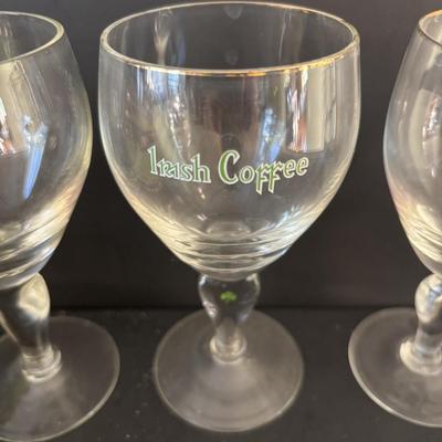 LOT 247: Collection of Irish Holiday Ornaments, Irish Coffee Stemware, Mary Engelbreit Scottie Dog Holiday Teapot