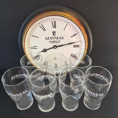 LOT 248: Guinness Collection: Wooden Clock, Pint Glasses and a Framed Poster