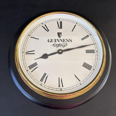LOT 248: Guinness Collection: Wooden Clock, Pint Glasses and a Framed Poster