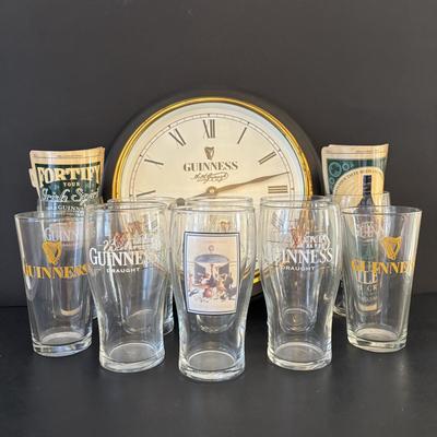 LOT 248: Guinness Collection: Wooden Clock, Pint Glasses and a Framed Poster