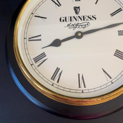 LOT 248: Guinness Collection: Wooden Clock, Pint Glasses and a Framed Poster