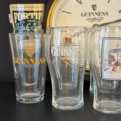 LOT 248: Guinness Collection: Wooden Clock, Pint Glasses and a Framed Poster
