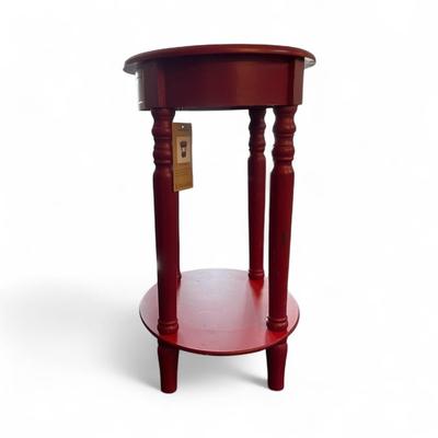 Sale Photo Thumbnail #3: Kirkland Red Side Table    Approximately 19.5"x 27"   Note  damage to one of the spindles.  Table is stable.