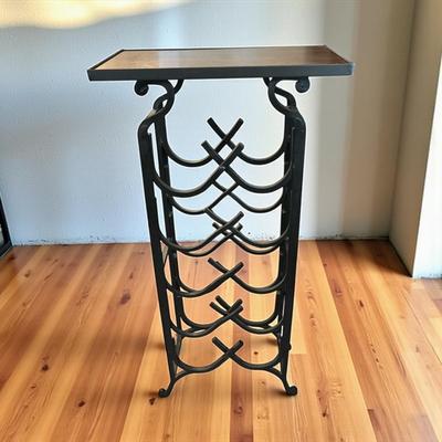 Sale Photo Thumbnail #20: Black Wrought Iron Decorative Scrollwork Wine Rack With  Top Shelf  Approximately 18.5"X10"x37"  Shelf is removable.  Missing to nuts and bolts that hold it together..