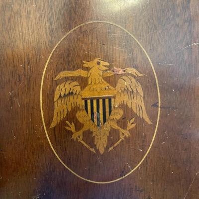 Sale Photo Thumbnail #48: Federal Style Mahogany Tilt-Top Table With Eagle and shield Motif  Approximately 18"X26"X27.5"