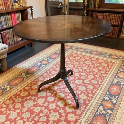 Sale Photo Thumbnail #47: Federal Style Mahogany Tilt-Top Table With Eagle and shield Motif  Approximately 18"X26"X27.5"