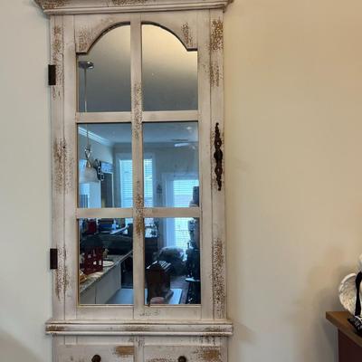 Sale Photo Thumbnail #171: Distressed White Farmhouse Wooden Window Pane Mirror with Two Faux Drawers and Coat Hooks
Approximately 21.5"X46"