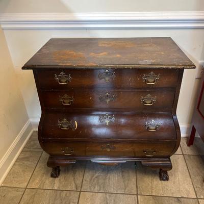 Sale Photo Thumbnail #175: Chippendale Style Bombe Chest of Drawers  Four Drawers.  Note Damage on the top of the chest.
Approximately 30"X18"X31"