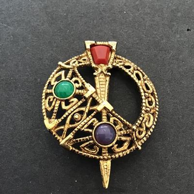 Sale Photo Thumbnail #48: Vintage gold tone , Sol d or, Celtic brooch. Please see attached photos.