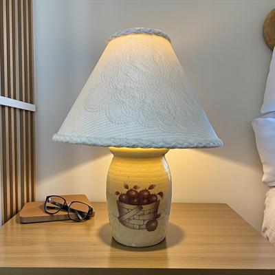 Sale Photo Thumbnail #179: Folk Art Pottery Table Lamp with a Basket of Apples Design on the Base
Approximately 15" Tall