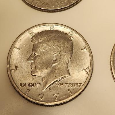 A Quad of Kennedy Half Dollars
