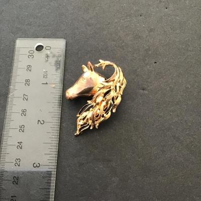 Sale Photo Thumbnail #85: Vintage, goldtone horse brooch very nice please see attached photos