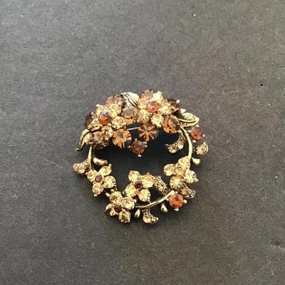 Sale Photo Thumbnail #87: Beautiful vintage, goldtone brooch with rhinestones signed by Beau jewelry. Please see Taz photos.