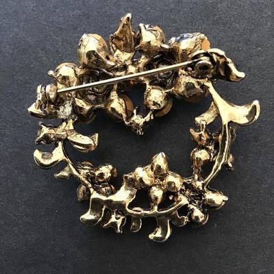 Sale Photo Thumbnail #89: Beautiful vintage, goldtone brooch with rhinestones signed by Beau jewelry. Please see Taz photos.