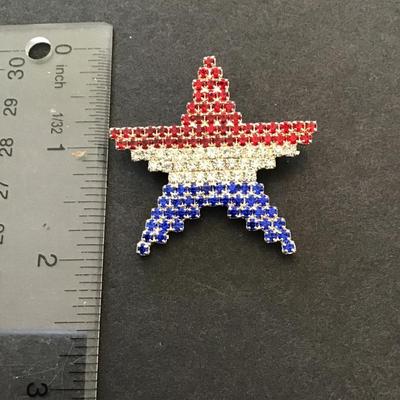 Sale Photo Thumbnail #101: Red white and blue patriotic star brooch. Please see attached photos.