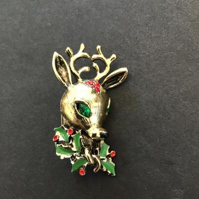Sale Photo Thumbnail #116: Beautiful vintage, gold tone, Christmas reindeer brooch. Please see attached photos.