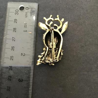 Sale Photo Thumbnail #118: Beautiful vintage, gold tone, Christmas reindeer brooch. Please see attached photos.