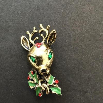 Sale Photo Thumbnail #117: Beautiful vintage, gold tone, Christmas reindeer brooch. Please see attached photos.