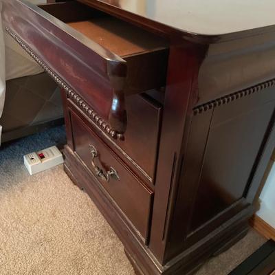 Pair of nightstands with hidden drawer
