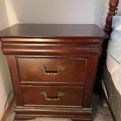 Pair of nightstands with hidden drawer