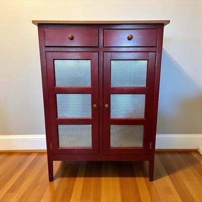 Sale Photo Thumbnail #200: Red and Natural Finish Pie Safe with Tin Inserts and Two Drawers By Southern Lifestyles
Approximately  40"X16"x54"  Three Shelves inside cabinet.