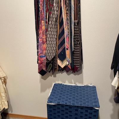 Large collection of ties with blue hamper