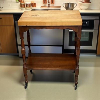Sale Photo Thumbnail #233: Rolling Butcher Block Cutting Board
Approximately 22.5"X14"X30