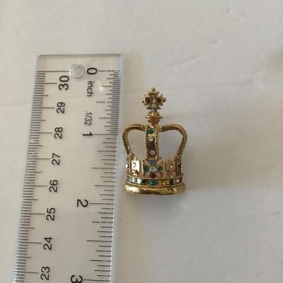 Gold tone crown pin