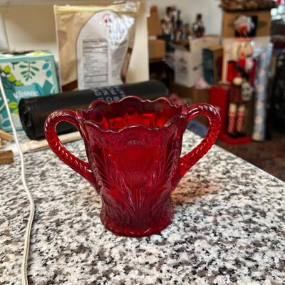 Sale Photo Thumbnail #246: Mosser Red  Inverted Thistle Glass Sugar Bowl with Double Handles  
Approximately 4"X4.5"