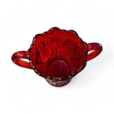 Sale Photo Thumbnail #243: Mosser Red  Inverted Thistle Glass Sugar Bowl with Double Handles  
Approximately 4"X4.5"