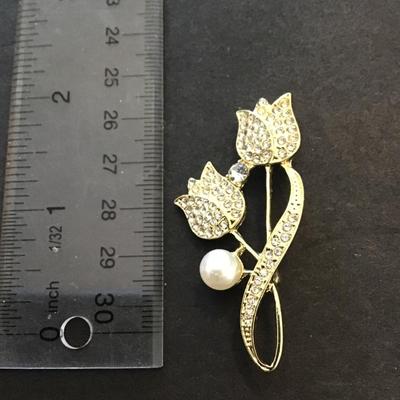 Sale Photo Thumbnail #51: Beautiful vintage, goldtone, flower brooch. Please see attached photos.