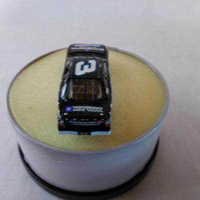 Sale Photo Thumbnail #69: 2001 OREO & GM Goodwrench Service Plus Chevrolet Monte Carlo in OREO Tin with COA 1:64 Scale 1 of 34161