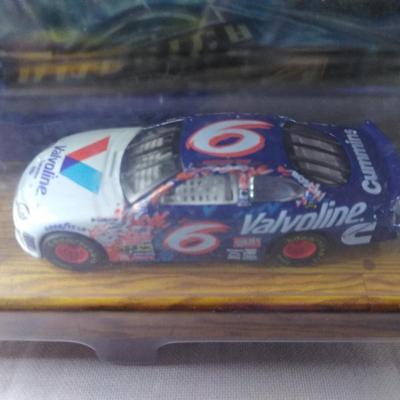Sale Photo Thumbnail #143: 1999 Valvoline Hot Wheels Roush Racing Rock America 1:64 Scale (Writing on reverse) / 2000 Valvoline Stars & Stripes Ford Taurus 1:64 Scale #O066162SS
